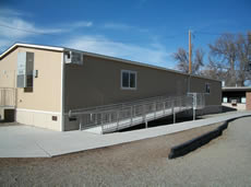 This is an example of Pierce Leasing's specialty buildings. We can see the back of a classroom construction.