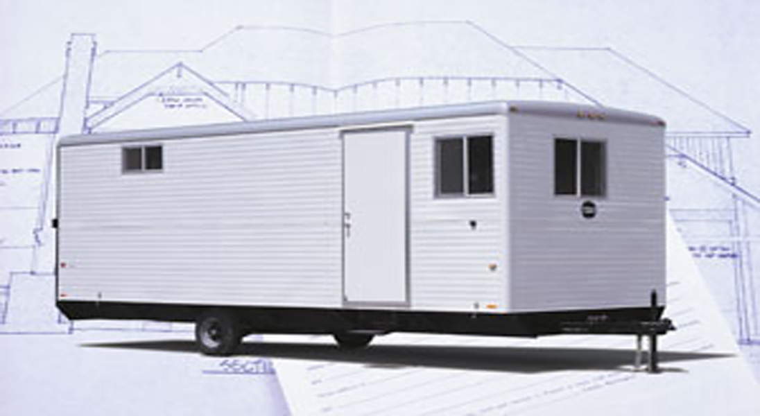 The Wells Cargo Office Wagon combines an office and a shop, functions efficiently with office space configurations.